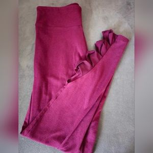 Victoria Sport size medium, plum leggings with ankle cut out details